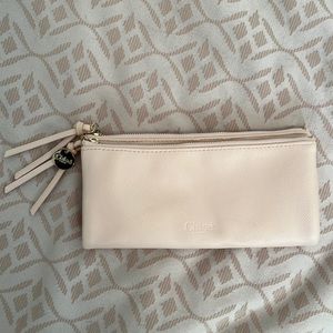 Chloe clutch in soft pink, 8” wide. Double zipper, expands open for more storage